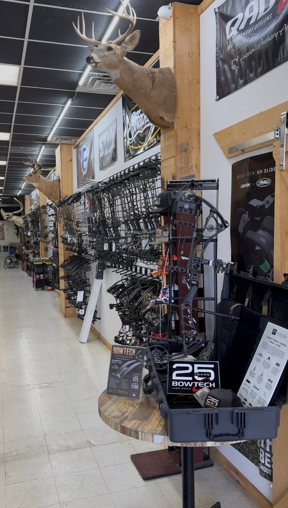 ATA technician working on a compound bow